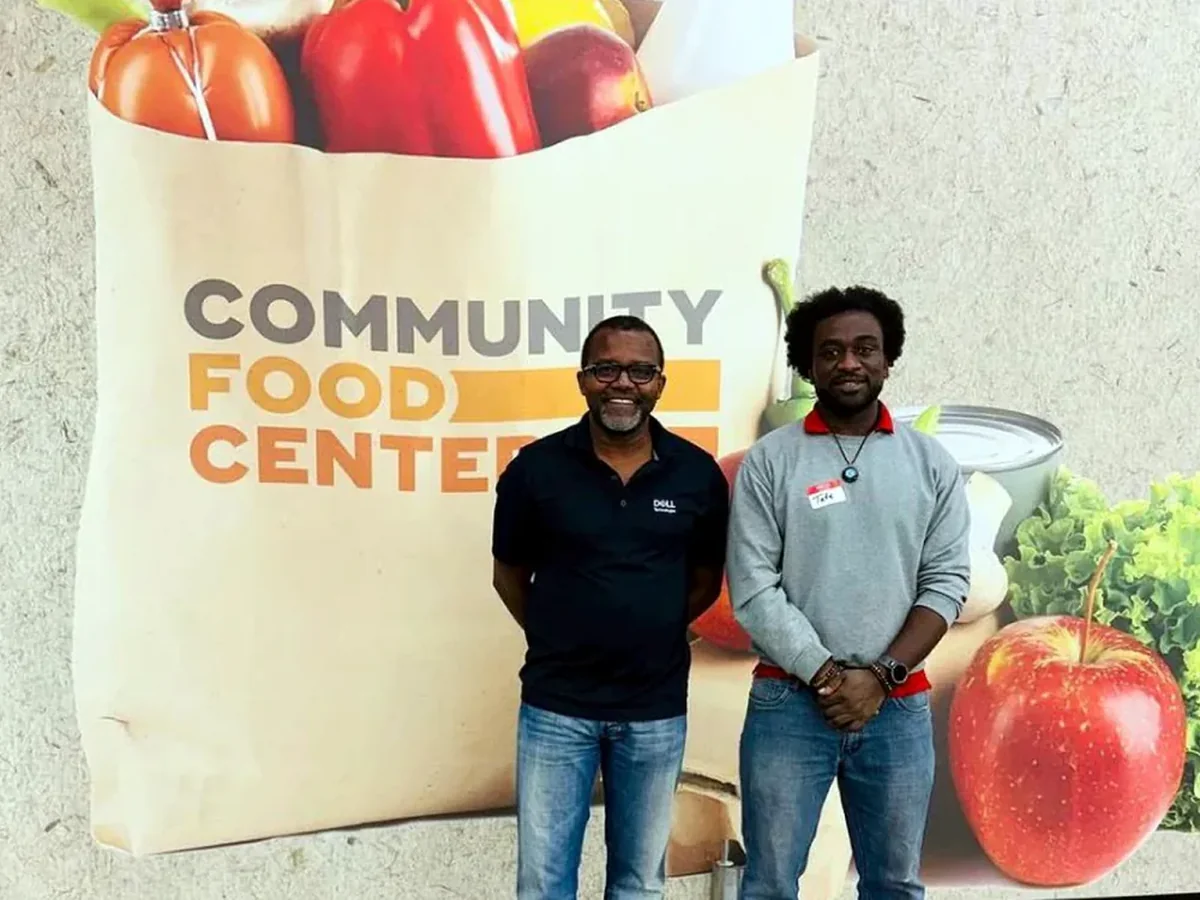 Two community partners standing together at a Community Food Center